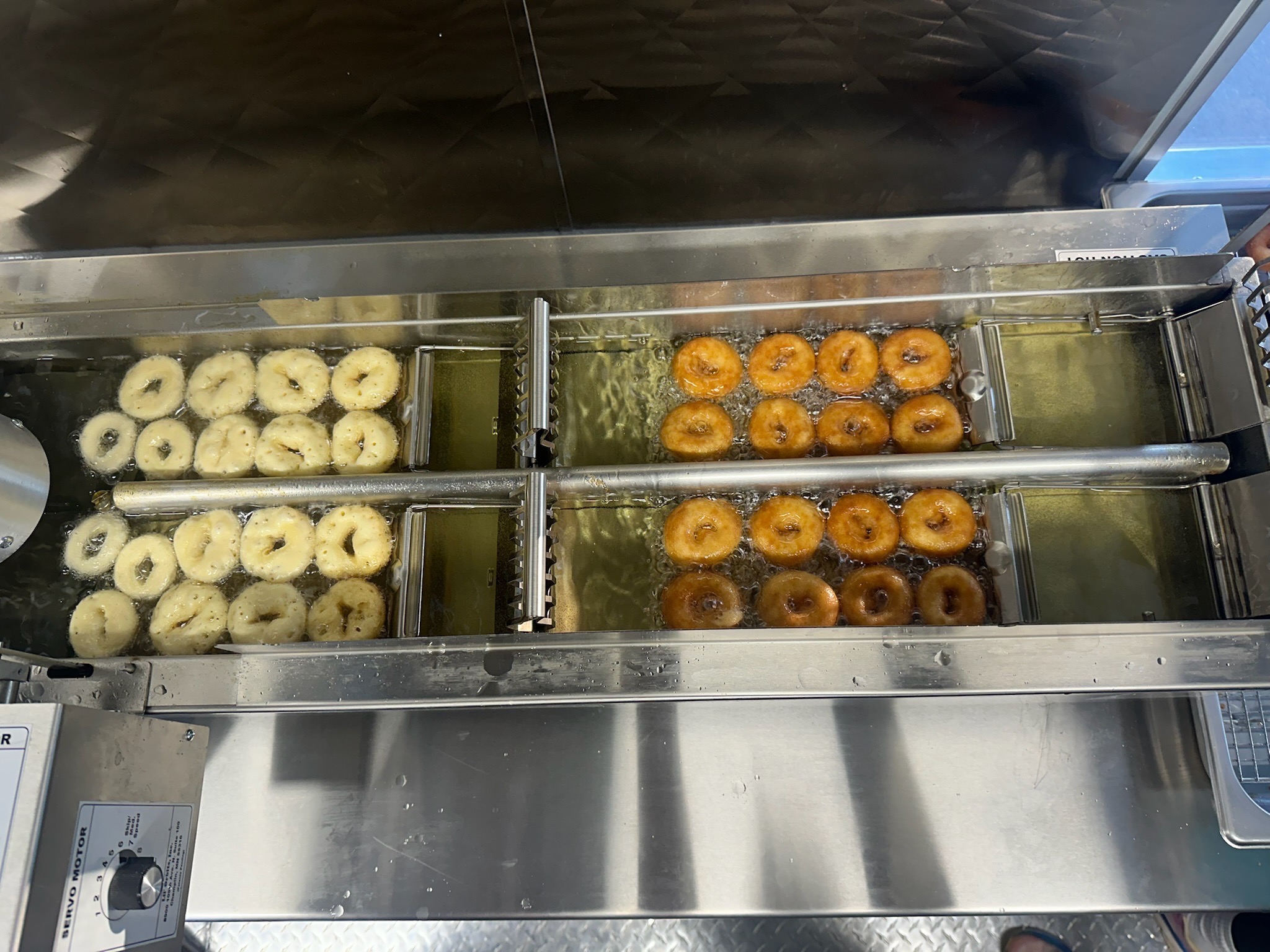 Mini donuts cooking fresh in Bub's donut fryer